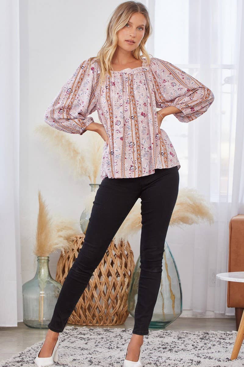 Floral print blouse with open back.
