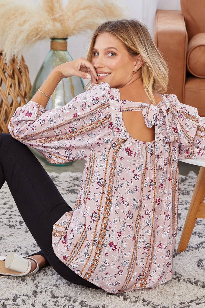 Floral print blouse with open back.