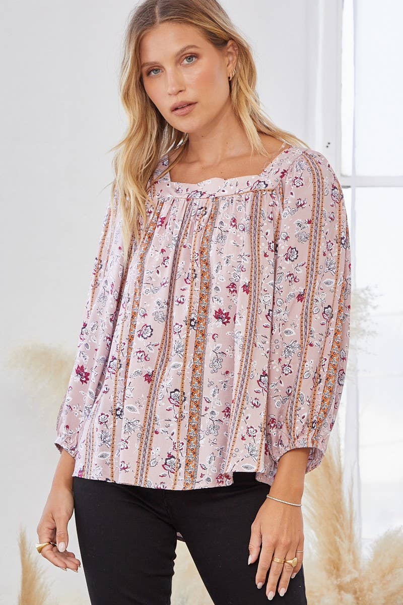 Floral print blouse with open back.